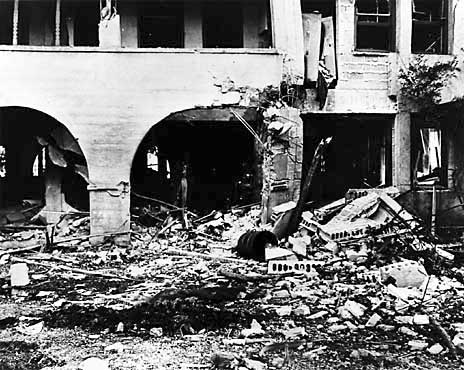 black and white photo of ruined building.