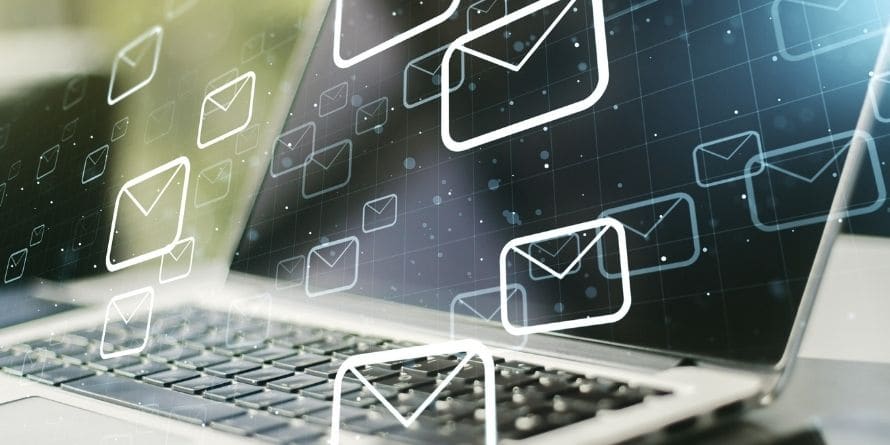 laptop with email icons floating around Used for grants opportunities email newsletter sign up on ignite page for nonprofits