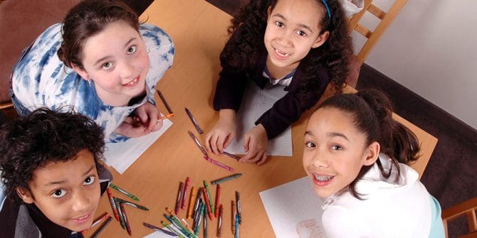 kids coloring at table kids coloring at table